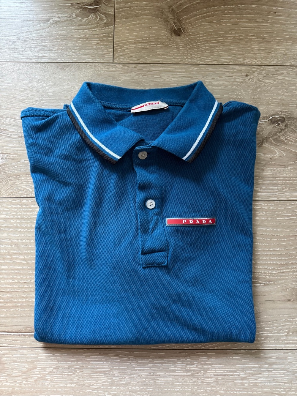 Prada Sport Teal-Blue Polo with Red Logo Patch